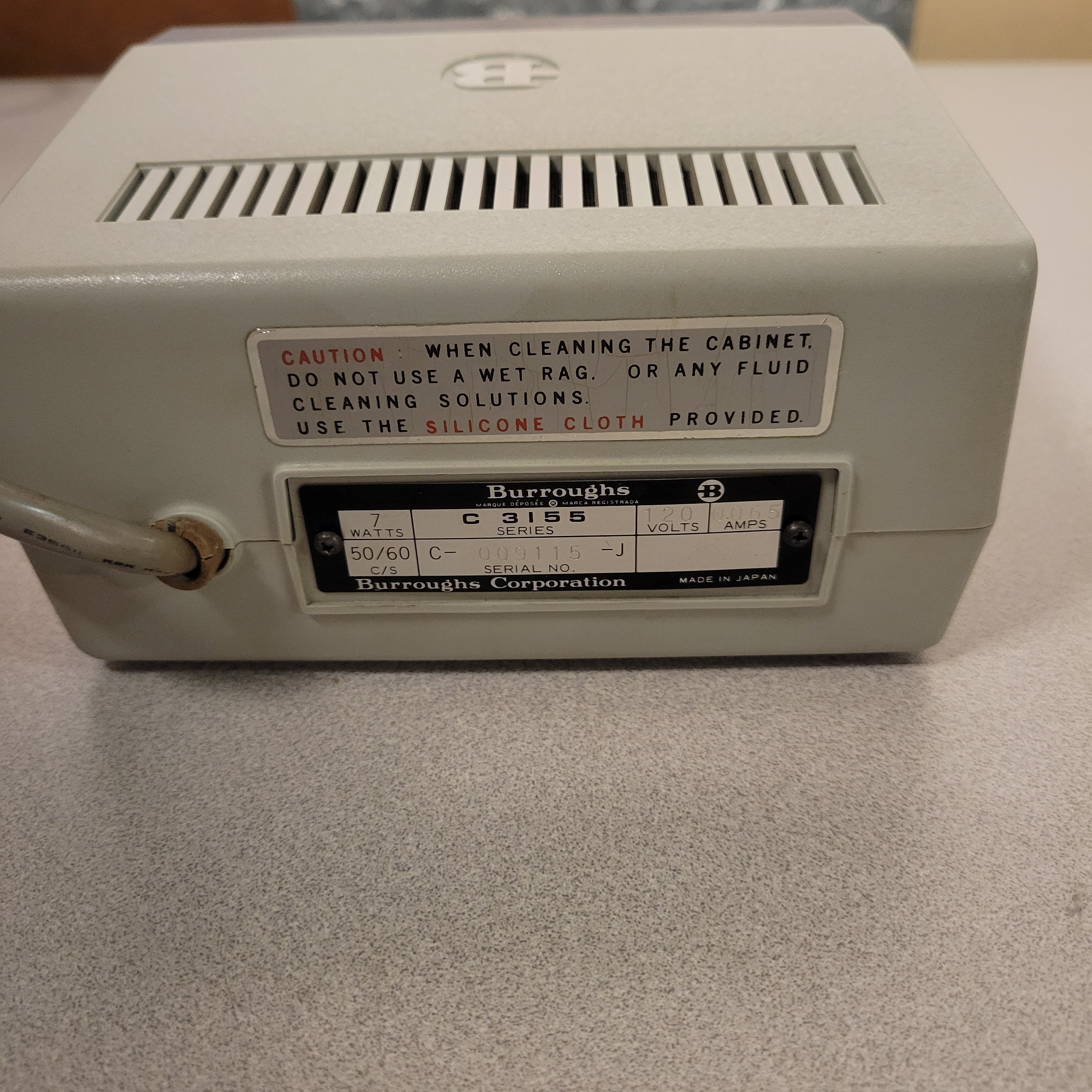 An image of the back of a Burroughs C 3155 desktop calculator